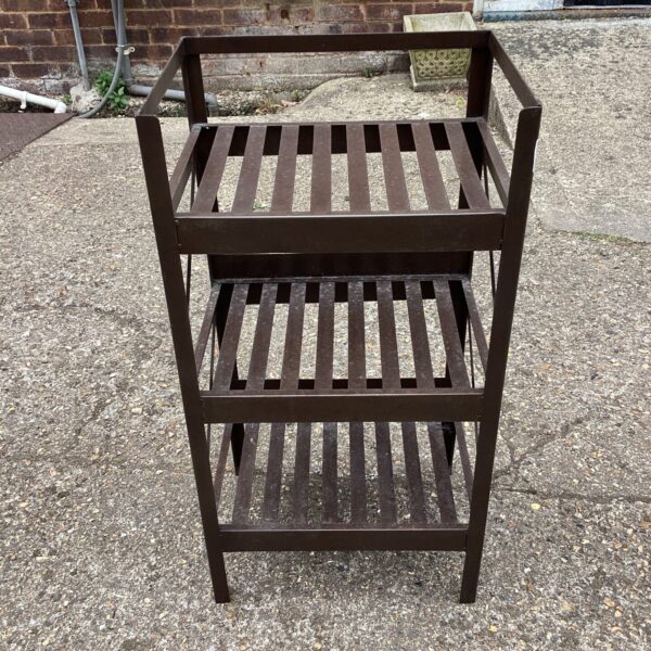 Three-tier metal storage racking unit for garage or workshop.