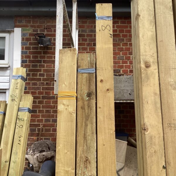 Outdoor timber bundles ready for construction or DIY projects.