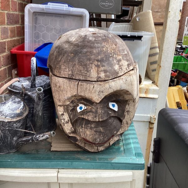 Vintage wooden monkey head box with hinged lid.