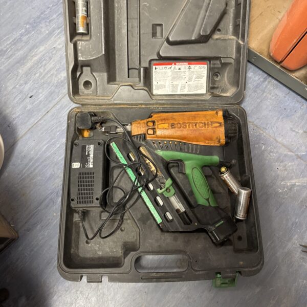 Bostitch cordless nail gun in open carrying case.