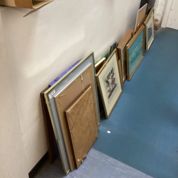 Lot of varied framed artwork and vintage prints for wall decor.