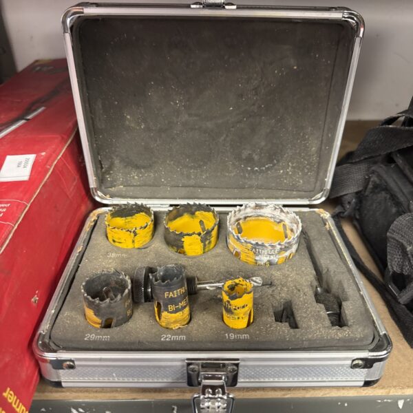 Open Faithfull hole saw kit showing various hole saw sizes.