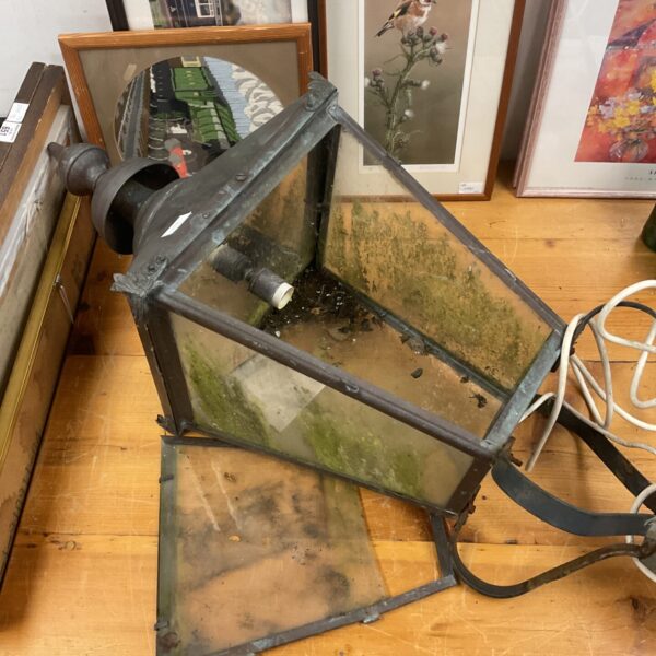 Large vintage copper street lamp head with weathered patina.