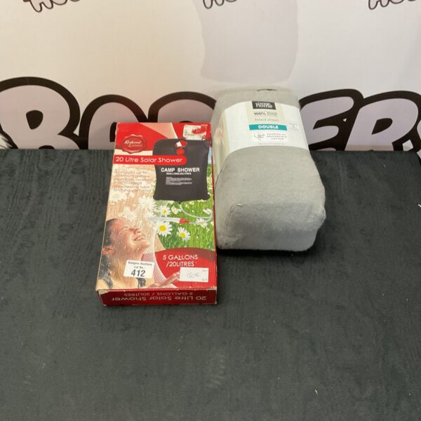 Redwood Leisure 20 litre solar shower with George fitted sheet for camping.