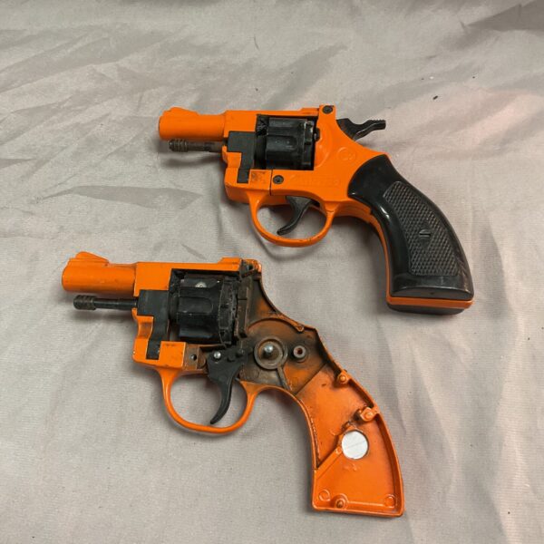 Pair of vintage Olympic starter pistols for collectors.