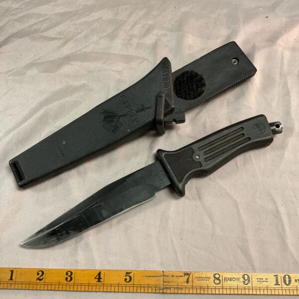 Used Gerber Patriot knife with black sheath, serial number 689.