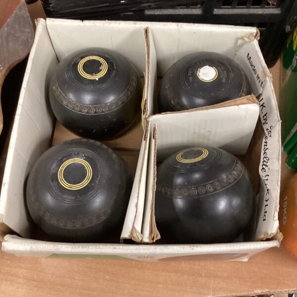 Set of four Almark bowling bowls for lawn bowls.