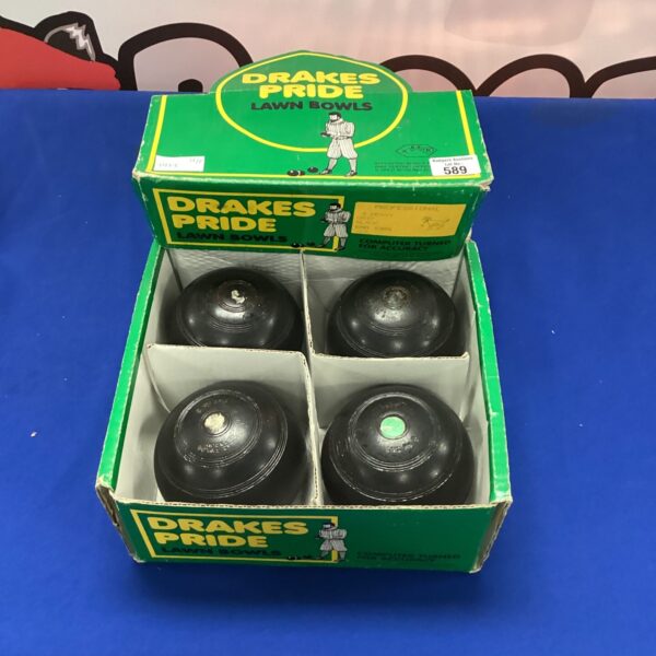 Vintage Drake Pride lawn bowls set for outdoor games.