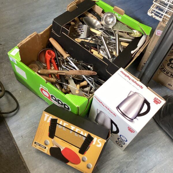 Mixed kitchen and dining lot with kettle and table tennis set.