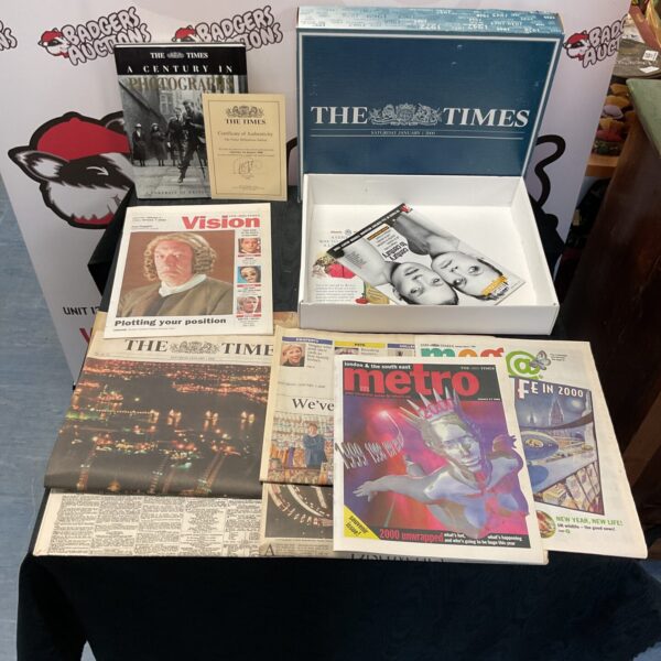 Lot of vintage *The Times* newspapers, historical British journalism.