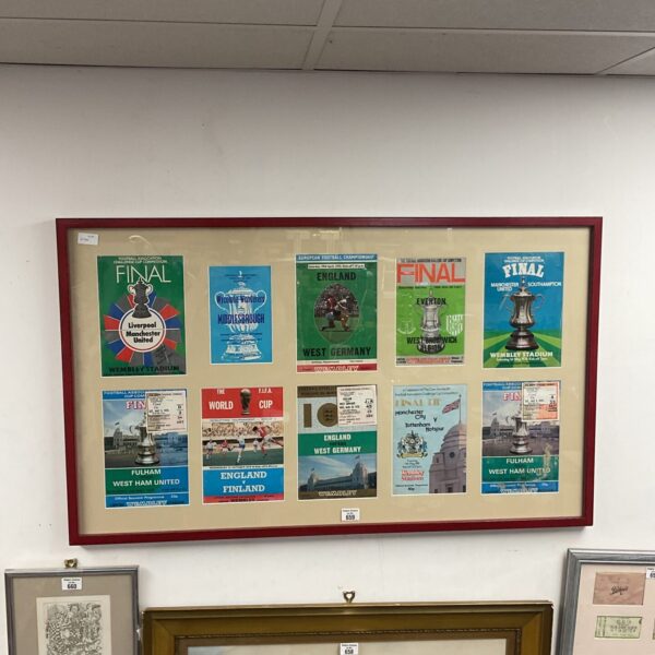 Framed collection of vintage 1970s football programmes, including Wycombe Wanderers and Liverpool.