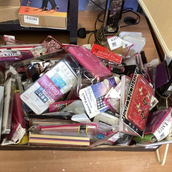Bulk lot of assorted phone cases and covers for smartphones.