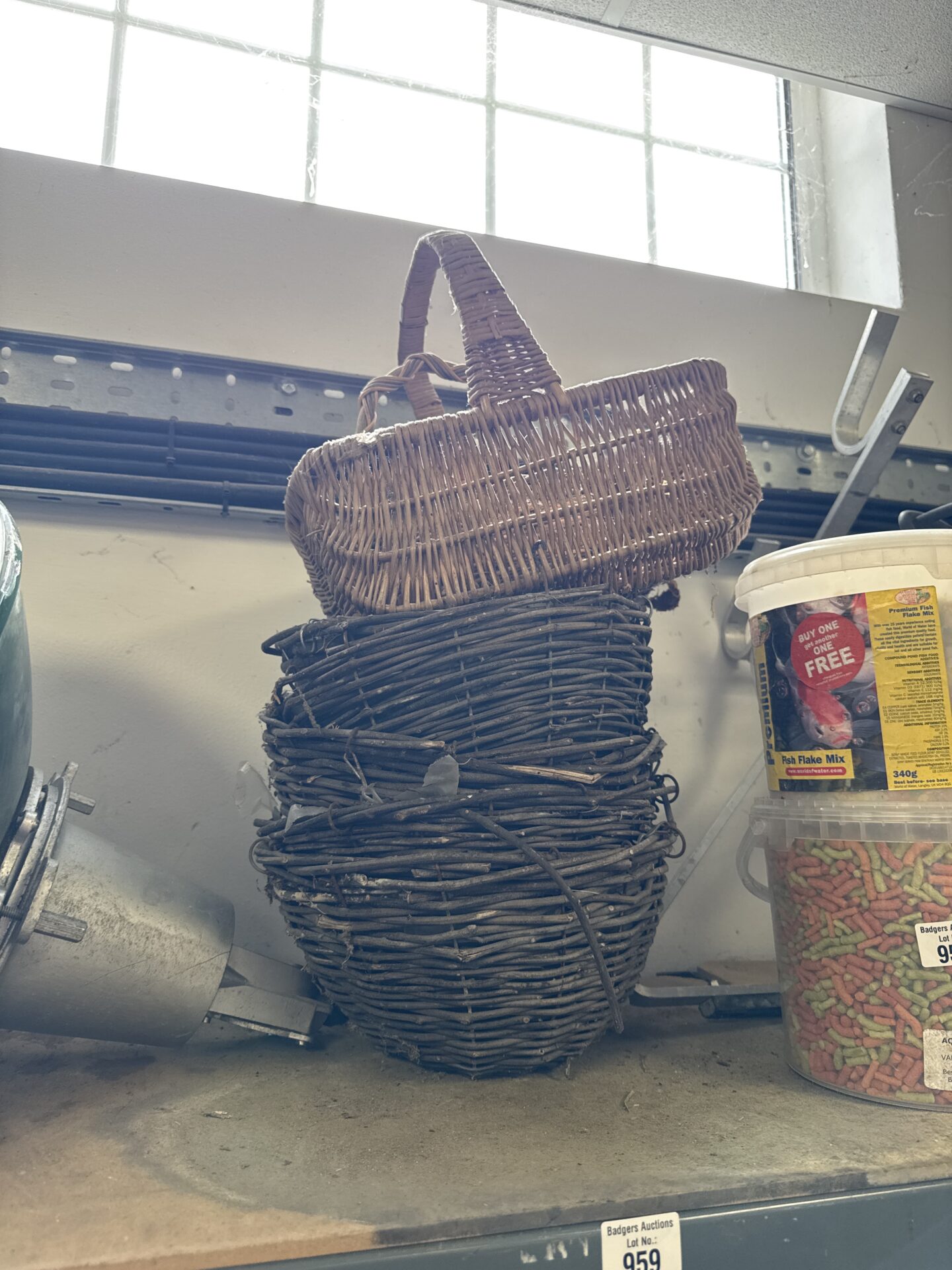 959 Three woven hanging baskets with wicker hand basket