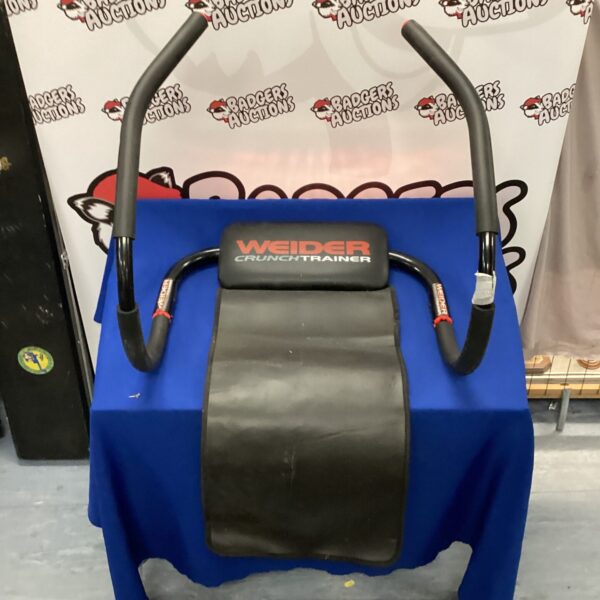 Side view of a Weider crunch trainer for abdominal workouts.