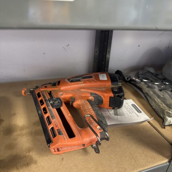 Paslode cordless nail gun body, ideal for construction and DIY projects.