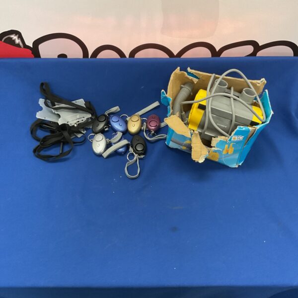 Mixed lot of security alarms, pump and lanyards for sale.