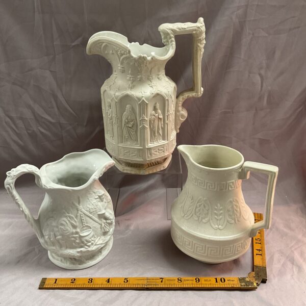 Antique Charles Meigh jug with religious scene in relief.