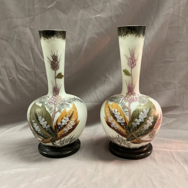 Antique Victorian milk glass vases with hand-painted floral design.