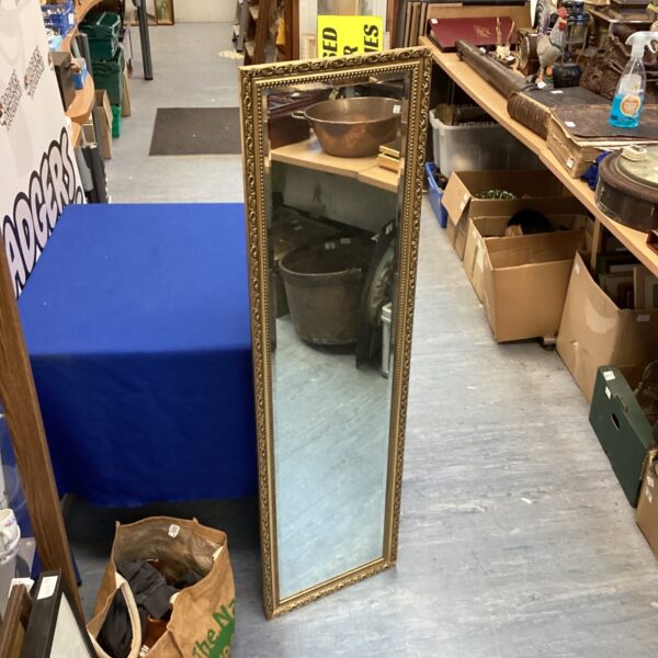 Elegant gilt framed bevel edged mirror for home decor.