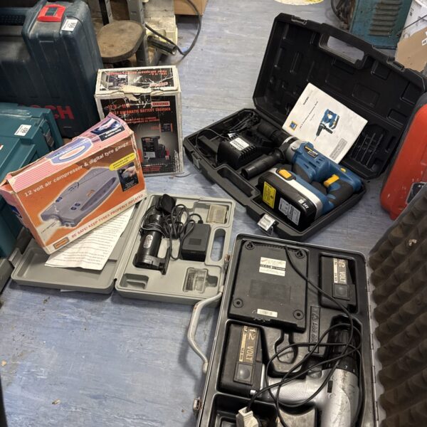 12V tyre inflator and battery charger in original packaging.