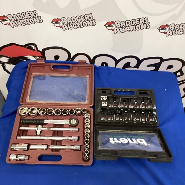 Vintage socket set and routing kit with various tools.