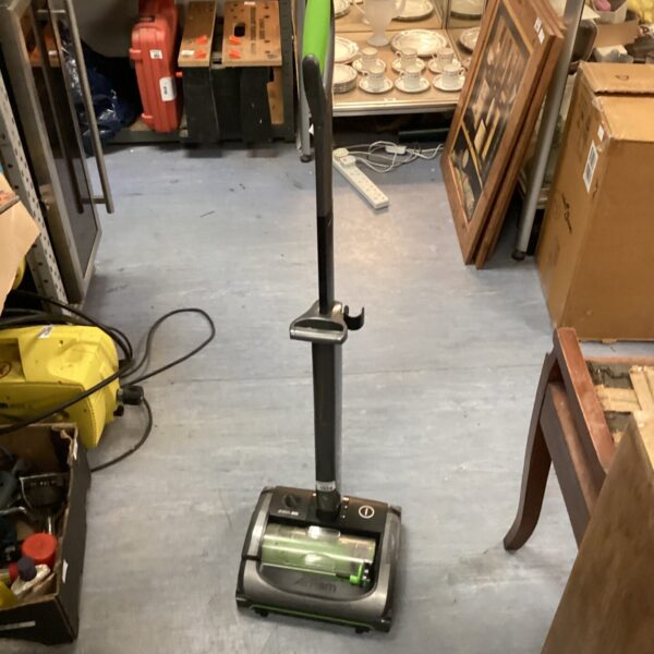 Gtech Air vacuum cleaner, cordless handheld cleaning appliance.