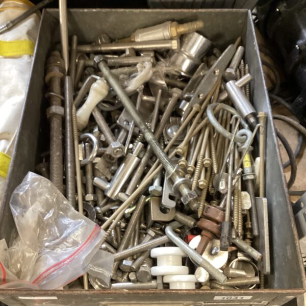 Large assortment of nuts and bolts for repair projects.