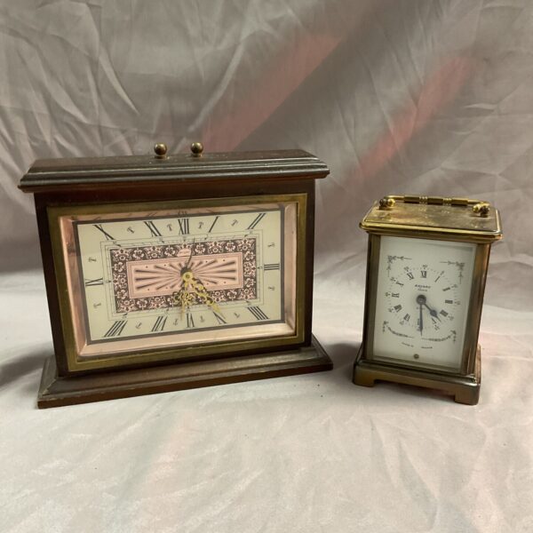 Antique Bayard carriage clock with brass case and enamel dial.