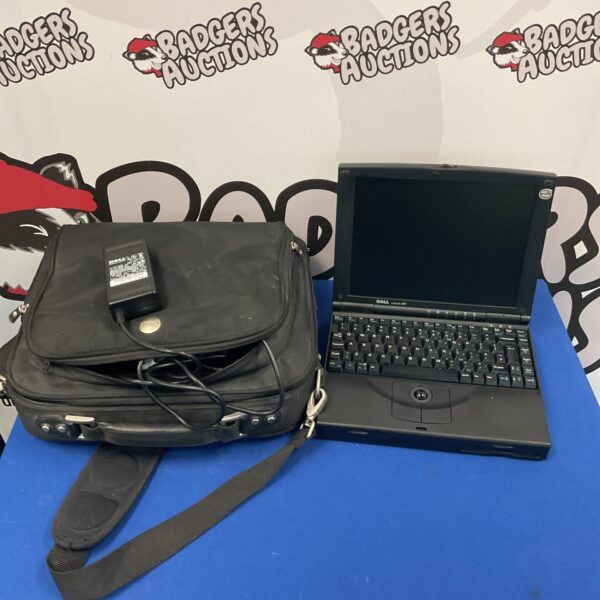 Vintage Dell Latitude XPI laptop with charger and case.