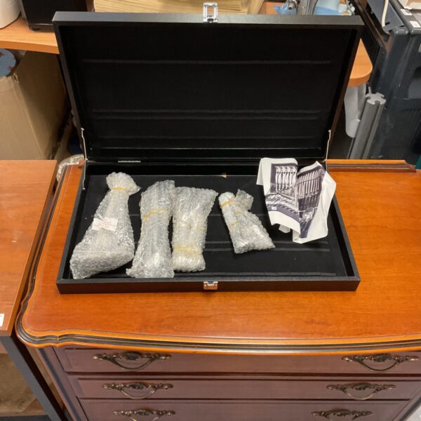 Vintage cutlery case with a complete silverware set inside.