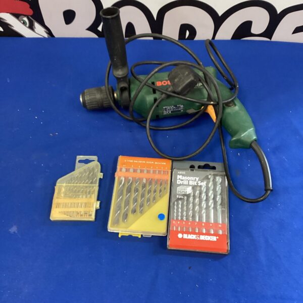 Bosch power drill with drill bit set for DIY projects.