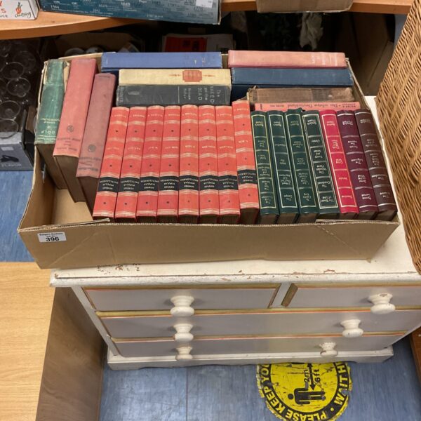 Vintage book lot with colourful spines and aged covers.