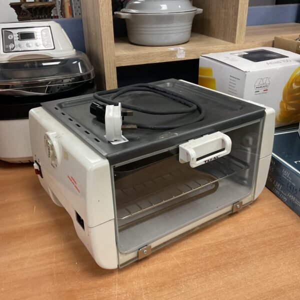 White Tefal tabletop oven, a compact kitchen appliance.