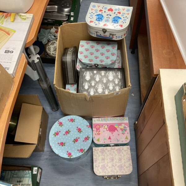 Assortment of patterned gift boxes for storage and gifting.