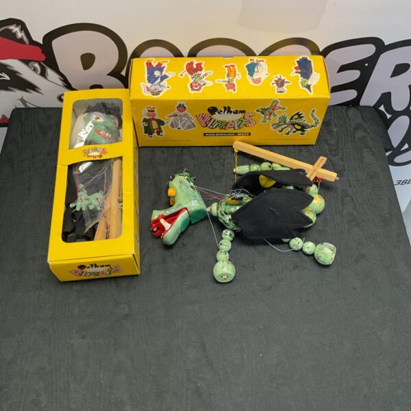 Vintage Pelham puppets, a Mother Dragon and Wicked Witch, in original boxes.