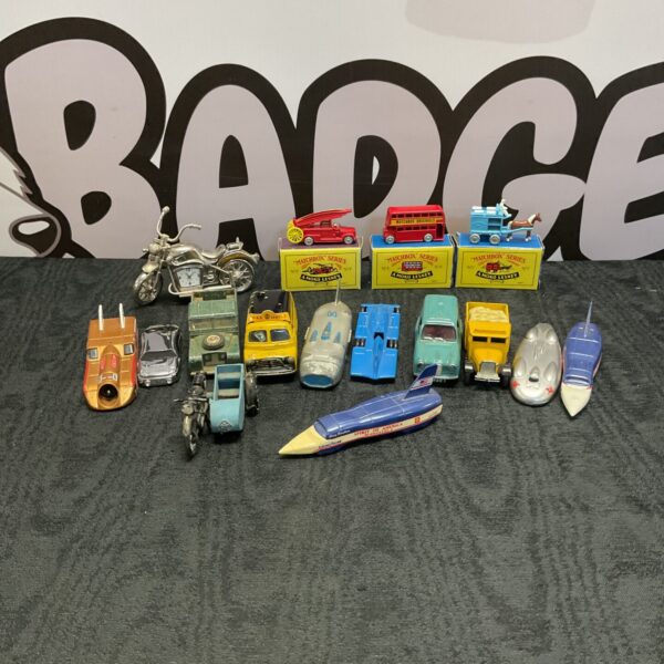Mixed lot of vintage and modern diecast model vehicles and tin toys.