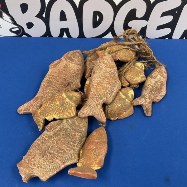 Vintage terracotta fish wind chime with oriental detailing.