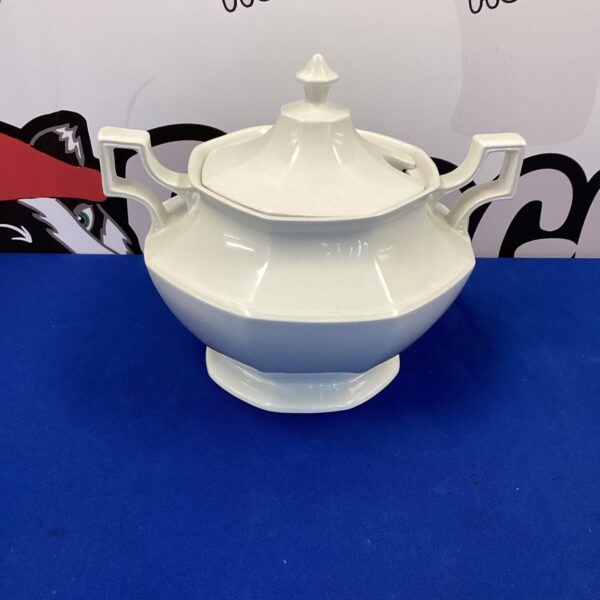 Elegant English porcelain soup tureen with decorative lid.