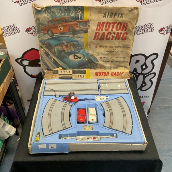 Vintage Airfix motor racing set in original packaging, collectible toy cars.
