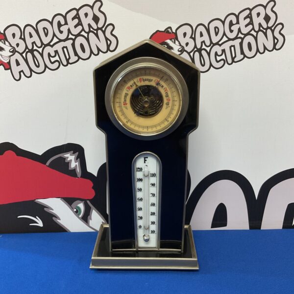 Vintage mercury desk barometer with metal case.