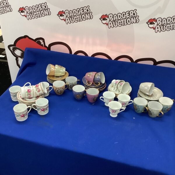 Five sets of floral bone china miniature coffee cups.