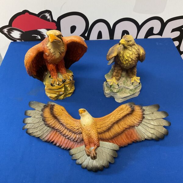 Group of vintage eagle ornaments, including Fraser Arts and Marcus chalkware.