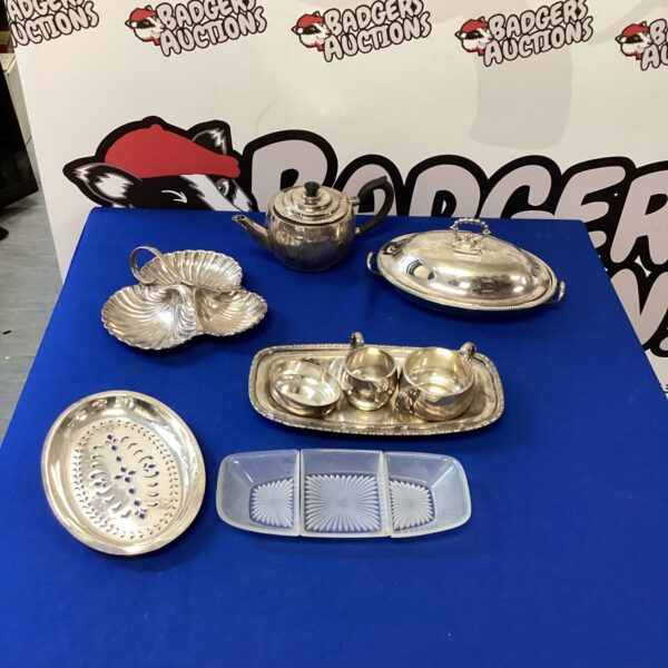 Vintage silverplate tableware collection with serving tray and dish.