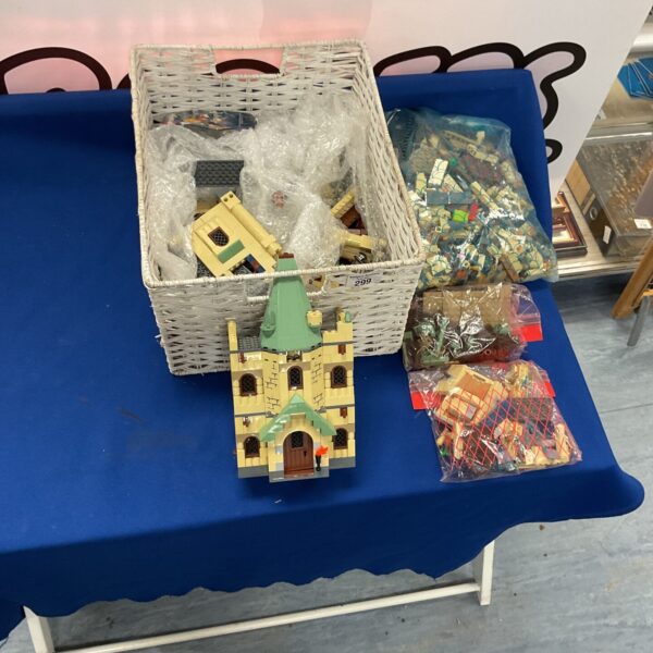 Overview of a mixed Harry Potter Lego lot with castle sections and minifigures.