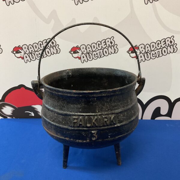 Vintage Falkirk cast iron cauldron with three legs.