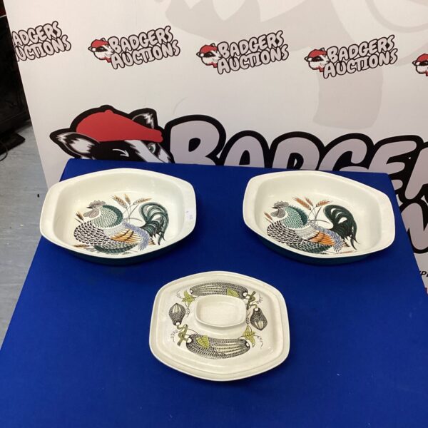 Vintage Poole Pottery oven proof dishes with floral design.