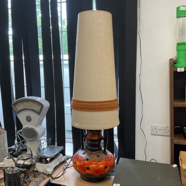 Vintage German fat lava table lamp with orange glaze.