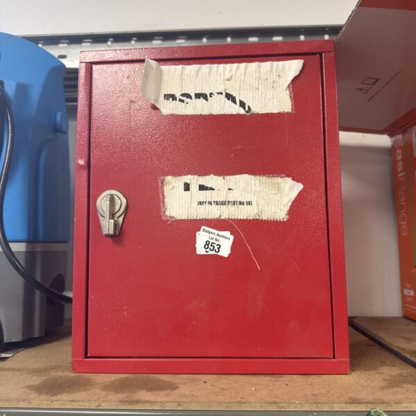 Vintage metal wall storage box with hinged door.