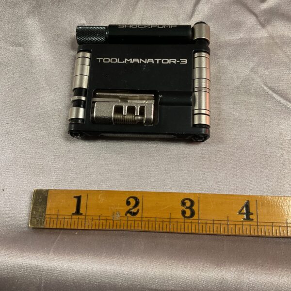 Black Blackburn Toolminator-3 bicycle multitool for quick repairs.