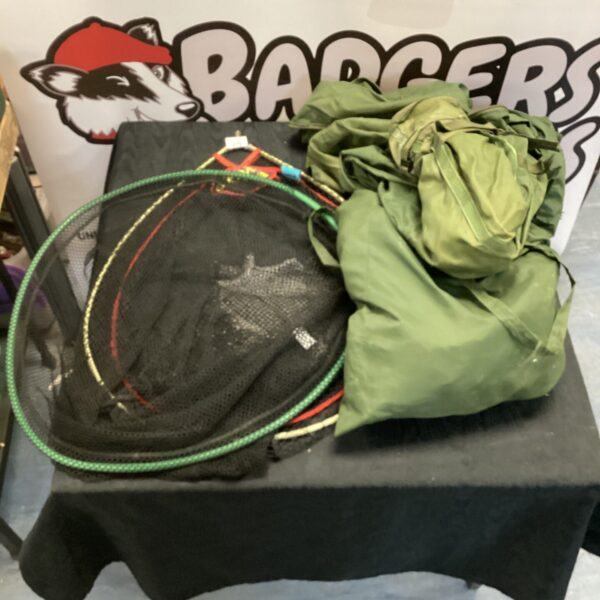 Fishing nets and bivvy wrap set for winter angling.